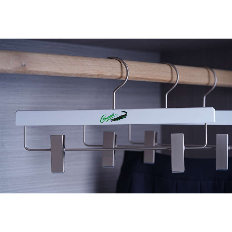 Ultrasonically Welded White Plastic Bottom Hanger with Clips